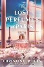 „The Lost Perfumes of Paris“. Ein Parfümflakon steht vor einem Fenster, im Hintergrund der Eiffelturm.
