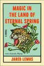 "Magic in the Land of Eternal Spring" in Rot und Gelb, darunter "Jared Lemus". Illustration mit brüllendem Jaguar und Mohnblumen.
