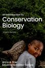 "An Introduction to Conservation Biology, Fourth Edition, Anna A. Sher, Eduardo González-Sargas. Frau lächelt mit Pangolin."