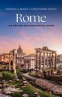 „Amanda Claridge & Christopher Siwicki, Rome, An Oxford Archaeological Guide“ vor römischen Ruinen im Sonnenuntergang.