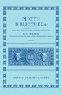 Titel: "PHOTII BIBLIOTHECA", Text: N. G. Wilson, "OXFORD CLASSICAL TEXTS", verziert mit floralen Mustern und Wappenschild.