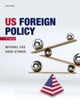„US Foreign Policy“, 4. Auflage von Michael Cox und Doug Stokes. Schwebende Kugeln auf Balken über USA-Pyramide.