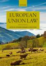 „European Union Law, Fifth Edition, Edited by Catherine Barnard & Steve Peers“. Kühe auf einer grünen Wiese, Berge.
