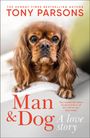 „Tony Parsons – Man & Dog: A Love Story“. Ein Hund liegt auf einer Decke und schaut aufmerksam nach vorn.