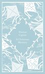 Text: "Truman Capote A Christmas Memory." Hintergrund: Hellblau mit weißen Drachenmotiven und einem weißen Rahmen.