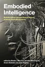 "Embodied Intelligence" und "Multidisciplinary Perspectives on Natural, Artificial, and Hybrid Systems" in Großbuchstaben. Mechanisches Gesicht voller Kabel.