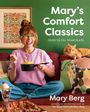 „Mary's Comfort Classics: Food to Fill Your Plate“, Mary Berg sitzt auf einem Sofa. Links ein gerahmtes Blumenbild.