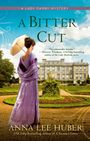Text: **"A Bitter Cut"**, "A Lady Darby Mystery", "Anna Lee Huber". Frau in lila Kleid mit Sonnenschirm vor Herrenhaus.