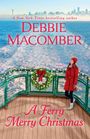 „DEBBIE MACOMBER, A Ferry Merry Christmas“. Eine Frau in einem roten Mantel steht auf einer Fähre mit einem Kranz.