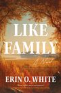 Text: "LIKE FAMILY", "A Novel", "ERIN O. WHITE". Eine herbstliche Landschaft mit Bäumen und weitem Blick.