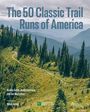 "The 50 Classic Trail Runs of America." Ein verschlungener Pfad führt durch eine bergige, grüne Landschaft mit Tannen.