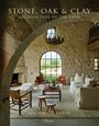 TEXT: "STONE, OAK & CLAY: ARCHITECTURE OF THE LAND", "MICHAEL G. IMBER". Elegantes Wohnzimmer aus Stein mit großem Fenster.