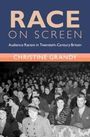 "RACE ON SCREEN: Audience Racism in Twentieth-Century Britain" von Christine Grandy. Schwarz-Weiß-Foto von einem Kinopublikum.