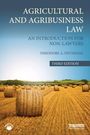 Titel: "AGRICULTURAL AND AGRIBUSINESS LAW". Strohballen in einem Feld unter blauem Himmel.