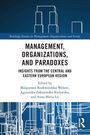 Buchtitel: "Management, Organizations, and Paradoxes". Abstrakte blaue und weiße Linienzeichnung von Gebäuden.