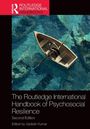 "The Routledge International Handbook of Psychosocial Resilience, Second Edition, Edited by Updesh Kumar." Ein Ruderboot auf klarem Wasser.
