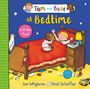 "Tom and Bear at Bedtime", "Lift the flaps!". Ein Junge und ein Teddybär im Bett, umgeben von Spielzeug und einer Lampe.