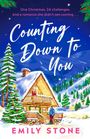 "One Christmas. 24 challenges. And a romance she didn’t see coming... Counting Down To You. Emily Stone." Eine verschneite Hütte mit Paar.