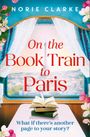 "On the Book Train to Paris." Vorhang mit Blumen, Eiffelturm im Fenster, zwei Bücher auf einem Tisch.