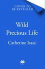 Text: "COVER TO BE REVEALED", "Wild Precious Life", "Catherine Isaac". 
Ein blaues Hintergrunddesign mit umgeschlagener Ecke. Logo von Macmillan.