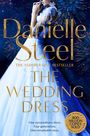 „Danielle Steel, The Wedding Dress“, golden. Eine Braut in Spitzenkleid, funkelnder Hintergrund mit Feuerwerkseffekten.