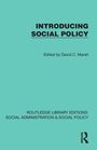 "INTRODUCING SOCIAL POLICY", herausgegeben von David C. Marsh, gehört zur Routledge Library Editions. Turkisfarbener Hintergrund.