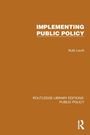 "IMPLEMENTING PUBLIC POLICY", Ruth Levitt; Routledge Library Editions: Public Policy. Brauner Hintergrund, weißer Text.