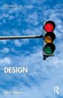 „DESIGN“ von Ole B. Jensen. Ampel mit rotem Licht vor blauem, wolkigem Himmel.