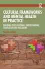 Oben: "Cultural Frameworks and Mental Health in Practice". Zwei Kopfsilhouetten mit bunten Puzzleteilen auf Holz.