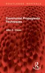 "Communist Propaganda Techniques" von John C. Clews. Rotes, strukturiertes Muster mit "Routledge Revivals" Logo.