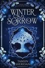 "Winter Sorrow" und "Tamsin Sheridan" stehen in der Mitte. Ornamente und ein leuchtender Baum zieren das Design.