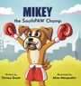 Titel: "MIKEY the SouthPAW Champ". Ein fröhlicher Hund mit roten Boxhandschuhen hebt die Pfoten.