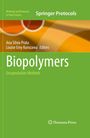 „Biopolymers: Encapsulation Methods“. Grün und orange mit Kreismuster, Springer Protocols Logo.