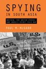 "SPYING IN SOUTH ASIA" von Paul M. McGarr. Schwarz-weißes Foto mit Demonstranten und Plakaten gegen US-Imperialismus.