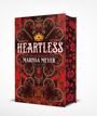 Text: "HEARTLESS" und "Marissa Meyer". Ornamentale Gestaltung mit Kronen, Schwertern und einem Schloss.