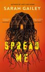 "SPREAD ME" steht in großen gelben Buchstaben auf einem orangefarbenen Hintergrund mit einem künstlerischen Haus und Tentakel.