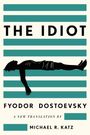 "The Idiot" von Fyodor Dostoevsky, neu übersetzt von Michael R. Katz. Silhouette einer liegenden Person auf Streifen.