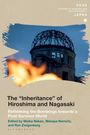 Titel: The "Inheritance" of Hiroshima and Nagasaki. Ruine im Hintergrund mit unscharfer Flamme im Vordergrund.