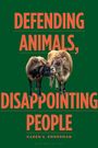Text: "Defending Animals, Disappointing People" von Karen S. Emmerman. Zwei Kühe berühren zärtlich ihre Köpfe.