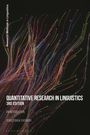 "Quantitative Research in Linguistics, 3rd Edition, An Introduction, Sebastian M. Rasinger." Bunte Linien auf schwarzem Grund.