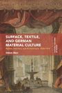 Titel: "Surface, Textile, and German Material Culture". Historische Innenarchitektur mit prunkvollen Details.