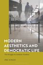 MODERN AESTHETICS AND DEMOCRATIC LIFE von Jörg Schaub. Personen reflektiert in Glas, darunter Tische und eine liegende Person sichtbar.