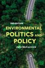 2nd Edition: Environmental Politics and Policy, John McCormick. Luftaufnahme einer Straße durch einen Wald.