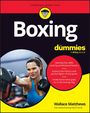 "Boxing for dummies" Buchcover: Boxerin mit Handschuhen, Titel, Autor Wallace Matthews, Text über Boxtechniken.