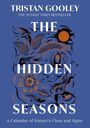 Text: "Tristan Gooley", "The Sunday Times Bestseller", "The Hidden Seasons", "A Calendar of Nature’s Clues and Signs".  
Naturillustration mit Beeren, Blume, Hase und Sonne.