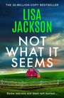 Text: "THE 30-MILLION-COPY BESTSELLER", "LISA JACKSON", "NOT WHAT IT SEEMS", "Some secrets are best left buried...". Bild: Rote Scheune auf grüner Wiese.