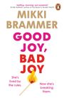 "GOOD JOY, BAD JOY" in großen Buchstaben. Unten brennt ein Streichholz. Links: "She's lived by the rules." Rechts: "Now she's breaking them."