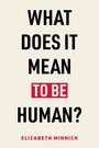 Text: "WHAT DOES IT MEAN TO BE HUMAN? ELIZABETH MINNICH." Schwarze und rote Schrift auf hellem Hintergrund.