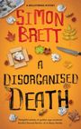"SImon Brett: A Disorganised Death - 'Delightful echoes of golden age mysteries'. Herbstblätter, ein Messer, zerknülltes Papier."
