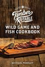 "REALTREE PRESENTS Timber 2 Table Wild Game and Fish Cookbook. Michael Pendley." Holzbrett mit geschnittenem Fleisch und Messer.
